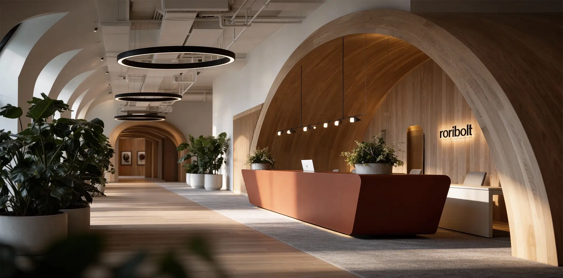 İstanbul ofis projesinde kavisli ahşap kemerli mimariye sahip modern ofis tasarımı resepsiyon alanı tasarımı